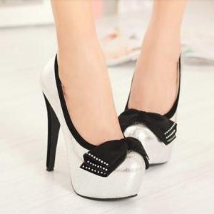 silver high heels with bow