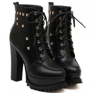 chunky black studded boots