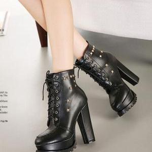 chunky black studded boots